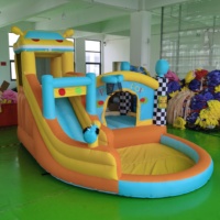 Château gonflable multifonctionnel pour usage domestique avec toboggan et piscine