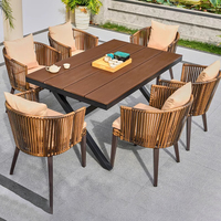 Ensemble de meubles de salle à manger d'extérieur pour hôtel ou villa, style moderne, design rectangulaire noir, pour 8 personnes, table et chaises
