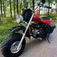 Moto polyvalente Honda Big Ruckus d'occasion pour la recherche, le sauvetage et les loisirs - Performances fiables