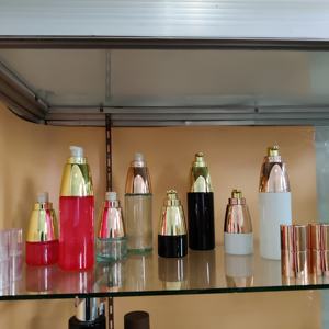 Unico A Forma di 30ml 100ml <span class=keywords><strong>Nero</strong></span> <span class=keywords><strong>Bianco</strong></span> Rosso Verde Bottiglia di Vetro per il Siero Olio Essenziale Lozione Per Il <span class=keywords><strong>Liquore</strong></span> con Oro rosa Pompa - Product Image 5