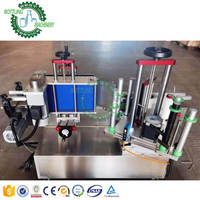 Machine à étiqueter auto-adhésive avec codage de ruban, automatique, pour le parfum, le détergent, la lessive, les bouteilles rondes, les tubes, les bocaux