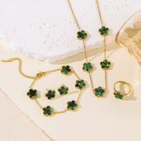 Ensemble de bijoux cinq pièces en acier inoxydable pour femme, motif fleur à cinq trèfles, style INS, comprenant collier, bracelet et boucles d'oreilles, tendance, transfrontalier
