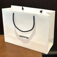 Maßgefertigte Umweltfreundliche Luxus-Papiertüte mit UV-Logo-Laminierung aus Recyclingmaterialien für Boutique-Verpackungen