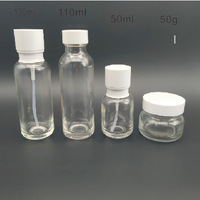 Vente en gros d'ensembles d'emballages en verre personnalisés, flacon en forme de bouteille de lait, flacon en verre cylindrique de 50 ml, pompe à lotion, flacon d'huile essentielle