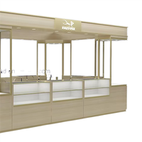Conception de kiosque à bijoux LED personnalisé et attrayant, respectueux de l'environnement, en verre trempé et acier inoxydable pour comptoir de présentation en magasin