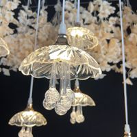 Nouveau lustre LED lumière 10 têtes méduse acrylique transparent lumière de méduse volante pour la décoration de plafond de fête de mariage