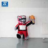 Modèle d'ours gonflable floqué personnalisé en tenue de motard pour événements commerciaux, promotion de marque, publicité et décoration