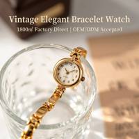 Montres pour femmes en gros, élégante montre-bracelet en alliage doré, montre-bracelet vintage à quartz pour femmes, cadeau pour femmes