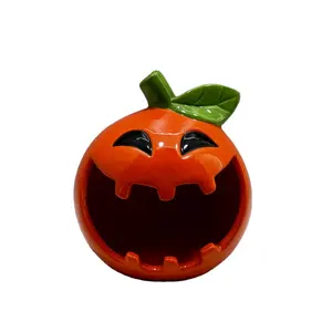 Hand painted ceramic pumpkin cookie holder for Halloween decoration