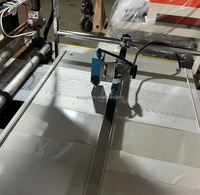 Machine de fabrication de sac en nylon à quatre lignes de chauffage et de coupe à froid pour les sacs de gilet de T-shirt
