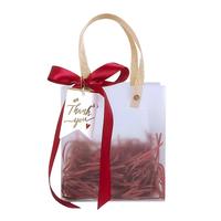 Logo personnalisé clair Transparent étanche Festival paquet cadeau PP poignée en plastique sacs cadeaux de mariage pour les invités