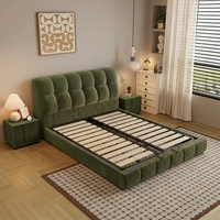 Lit double en métal capitonné crème, style minimaliste moderne italien, avec tête de lit en chenille en forme de coussin et système de levage à gaz intégré.