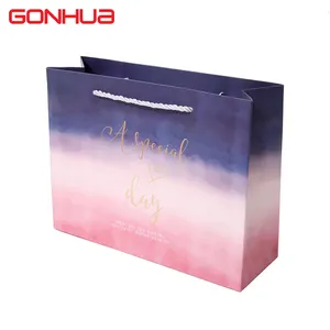 GONHUA özel Logo altın folyo geri dönüşümlü baskılı hediye kağıt torba perakende bez takı Kraft ambalaj alışveriş saplı çanta