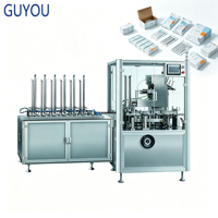 Machine d'emballage verticale automatique, approvisionnement direct usine pour l'emballage secondaire de sachets de poudre, liquides et granulés dans des boîtes