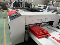 Ligne de production entièrement automatique de sacs en plastique pour t-shirts et t-shirts en nylon, machines de fabrication de sacs pour matériaux d'emballage