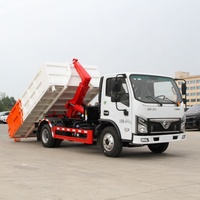 Camion benne hydraulique à bras articulé : Opération multi-conteneurs pour un transfert de déchets efficace et une logistique économique