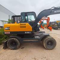 Excavatrice sur roues XINYUAN C85M avec pneus résistants à l'usure, transfert rapide sur site, certifiée CE pour les projets de pipelines et d'aménagement paysager