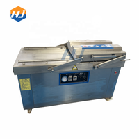 Machine d'emballage sous vide automatique à double chambre HJ pour l'emballage de tofu/tofu séché/boeuf/pommes de terre/viande/bacon/saucisses/sandwichs