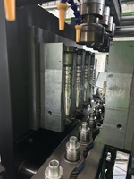 5000bph Servomotor de 4 cavidades Máquina automática de moldeo por soplado de botellas de PET