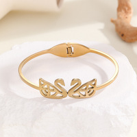Bracelet jonc double cygne en acier titane plaqué or pour femme, anti-ternissement, avec fermoir à ressort, bijou de mode de luxe, cadeau d'anniversaire