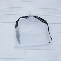 Vente en gros Pochette à bijoux de luxe en organza avec cordon de serrage Cadeau de Noël Sac cadeau d'anniversaire Pochette d'emballage en organza
