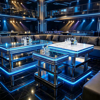Comptoir de bar autoportant avec structure en acier inoxydable et plateau en marbre, éclairage LED intégré pour les clubs KTV, les salons et les hôtels