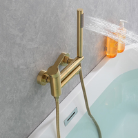 Robinet de baignoire sur pied en laiton avec douchette à main chromé pour salle de bain d'hôtel