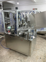 Machine automatique de remplissage et de scellage pour emballages de tubes souples en plastique de crème pour les mains, lotion, cosmétiques liquides et boue douce, à ultrasons.