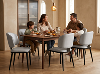 Chaise de salle à manger moderne rembourrée en gros avec assise gris clair et pieds en métal noir mat pour hôtels et appartements