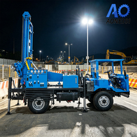 Foreuse de puits montée sur camion HOWO 4x2, profondeur 260m, double alimentation avec pieds de support pour l'approvisionnement en eau rural et l'approvisionnement des usines