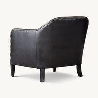 Chaise club en cuir de smoking français des années 1950 inspirée de la campagne de conception Sassanid et de l'ameublement Safari