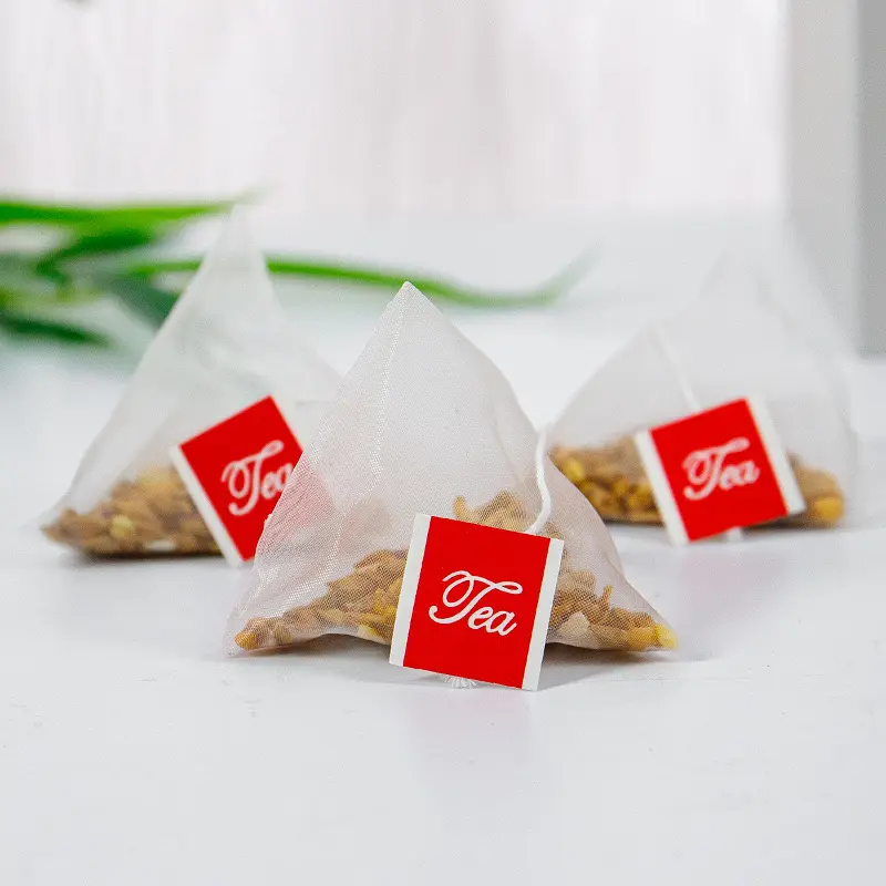 Pyramid nylon triangle tea bag with string custom logo label printing heat seal tea bags packaging