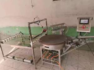 Buena idea de negocio 40-90 Máquina de tortilla de harina Pan de pita árabe Pizza Roti Chapati Tortitas completamente automáticas - Product Image 5