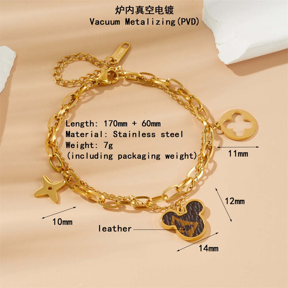 Pulsera de doble capa con trébol de cuatro hojas de Mickey Mouse.