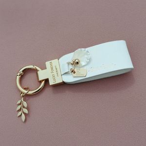 Hot Selling Exquisite and Cute French Alloy <b>Leather</b> <b>Keychain</b> with High Quality Rope Buckle for Car Pendant Women's Gift - Product Image 6