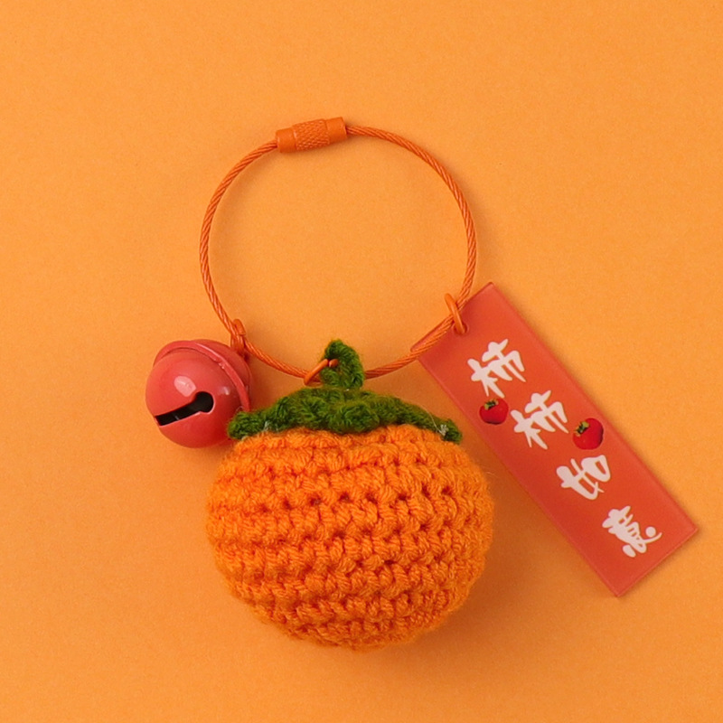 Caqui naranja claro (hojas oscuras) + caqui (aro de alambre)