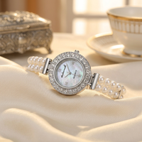Montre pour femme, bracelet de luxe en perles, montre-bracelet vintage avec lunette en strass ronde, bracelet en alliage, montres élégantes pour femmes