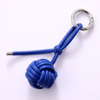 Porte-clés minimalistes en corde tressée avec nœud poing de singe, breloques de sac colorées en forme de boule, porte-clés en cuir PU de couleur unie pour femmes