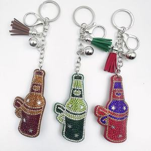 Creative diamond <strong>studded</strong> Red Wine Bottle Cartoon Tassel Korean Velvet Hot <strong>Pressed</strong> diamond Wine Bottle Bag Pendant Gift - Product Image 1