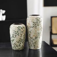 Vase en céramique de style chinois rétro, faux antique, luxe léger, haut de gamme, arrangement floral, décoration de salon avec un design simple