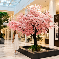 Grand arbre artificiel de cerisier rose clair, réaliste et personnalisable pour la décoration commerciale des hôtels et restaurants