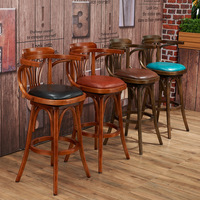 Ensemble de table et de chaises de bar en bois massif de style américain vintage avec accoudoirs pivotants et dossier, chaise de bar haute pour usage commercial