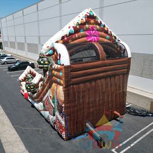 Toboggan aquatique gonflable sur le thème de la maison en pain d'épices de Noël, toboggan commercial à double voie pour la location de fêtes de fin d'année et le plaisir en plein air - Product Image 3