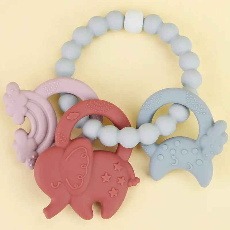 Wholesale Bpa Free Cute Soft Bracelet Ring Shape Moon Rainbow Elephant Rubber Silicone Baby Chew Sensory Teethers Toys Gift Set