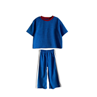Ensemble 2 pièces pour enfants en tissu éponge de coton, haut à manches courtes avec blocs de couleur et pantalon droit à rayures latérales