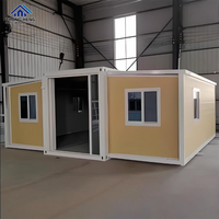 Maison modulaire en conteneur avec cadre noir fabriqué en usine, avec entrée en verre et fenêtres latérales pour villa, jardin, maison préfabriquée en conteneur