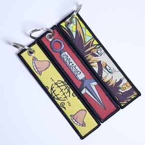 Vente en gros de porte-clés en tissu brodé de style japonais classique, porte-clés de poche avec motif de monstres de poche, porte-clés en tissu anime - Product Image 2