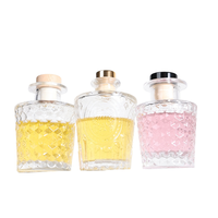 Bouteille diffuseur à roseaux en verre transparent de 100 ml pour l'aromathérapie à domicile avec emballage élégant et bouchon