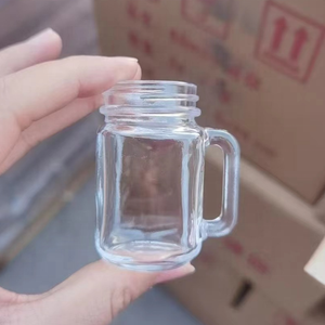 50ml Mini <strong>Mason</strong> <strong>Jar</strong> <strong>with</strong> <strong>Handle</strong> and Lid Salt Pepper Shaker Juice Beverage Drinking Bottle Shot Glass for Milk Plastic Cap - Product Image 2