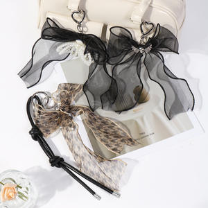 พวงกุญแจจี้กระเป๋าแบบตาข่ายประดับโบว์ผีเสื้อมุกและหัวใจสไตล์เกาหลียอดนิยมของ Mengda ทำด้วยมือ - Product Image 5